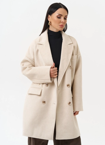 Двубортное женское пальто фото